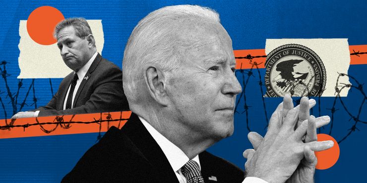 A photo illustration shows President Joseph R. Biden in the center, with Michael Carvajal, resigning director of the U.S. Bureau of Prisons, at the left.  Imagery of barbed wire is scattered throughout the illustration.  