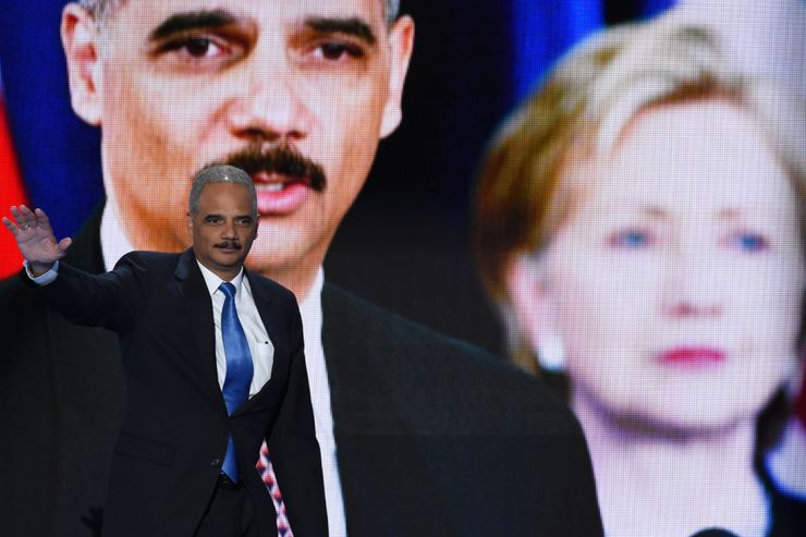 Former US Attorney General Eric Holder arrives on stage during the second day of the Democratic National Convention at the Wells Fargo Center, July 26, 2016 in Philadelphia, Pennsylvania.    / AFP / SAUL LOEB        (Photo credit should read SAUL LOEB/AFP/Getty Images)