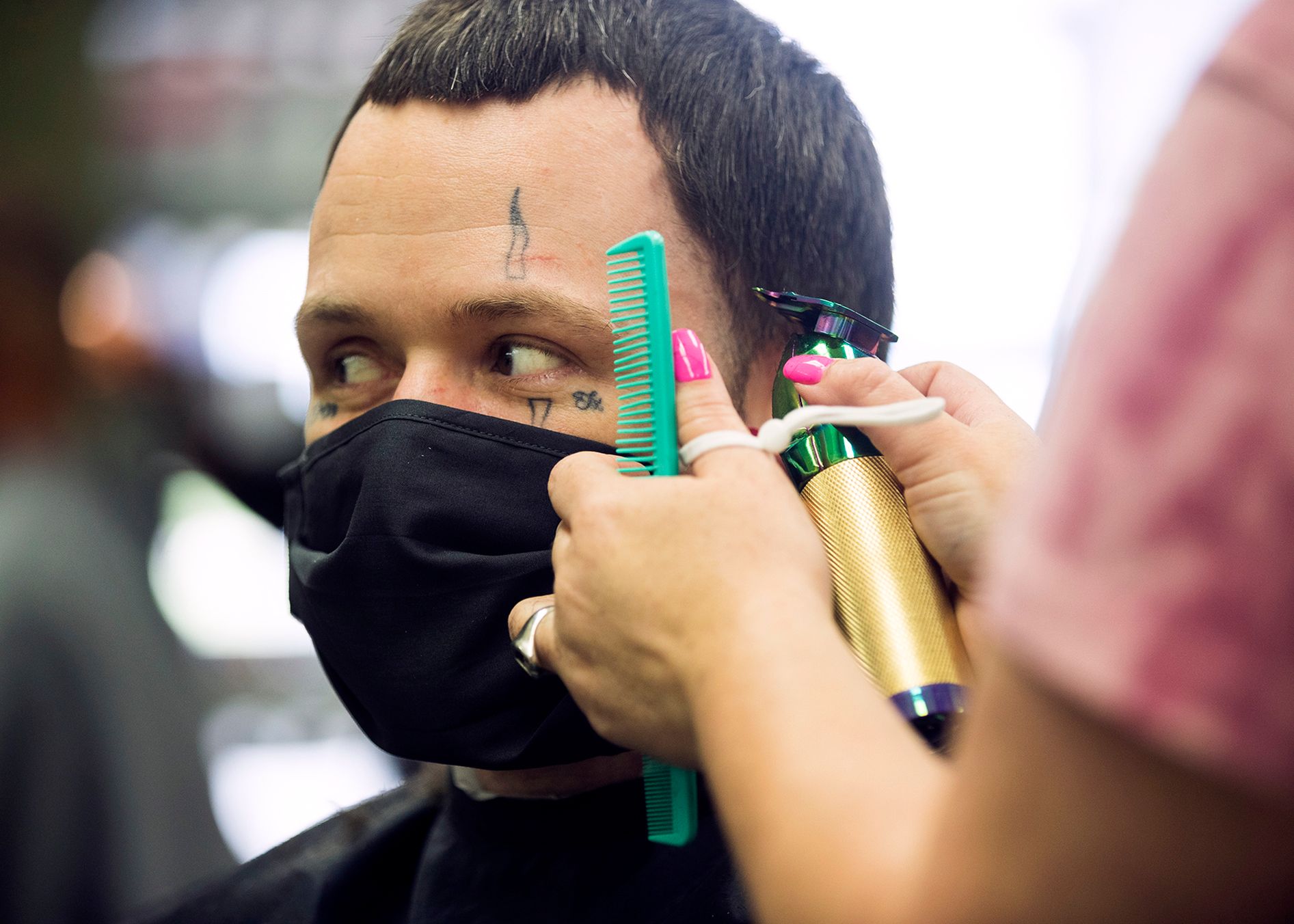 Trent Taylor received a haircut at the barber shop. 