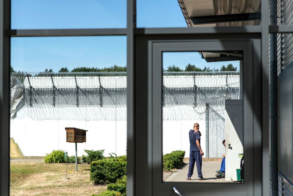 Inmates during a break at the vocational training facility inside Neustrelitz.
