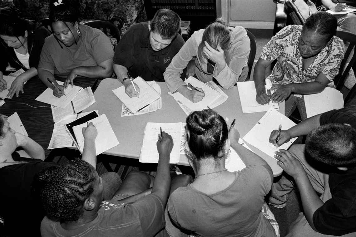 A writing workshop at Walden House where women are encouraged to write about their addictions. (Los Angeles, 2008)