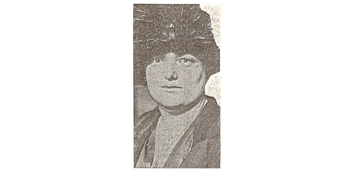 Black-and-white newspaper clipping of the headshot of Dorothy Doan Henry, a White woman in a hat.