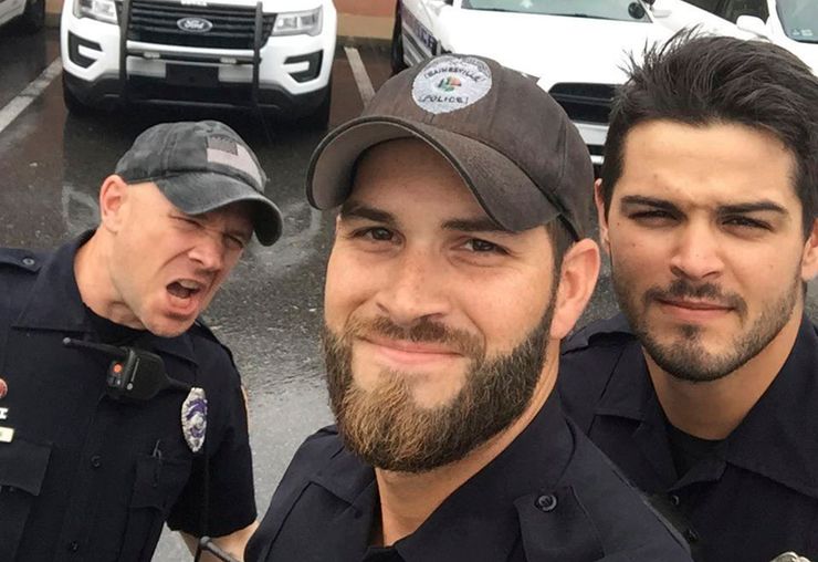 A photo posted on Facebook by the Gainesville Police Department showing officers, from left, John Nordman, Michael Hamill and Dan Rengering. It was widely shared with comments praising the officers’ looks. 