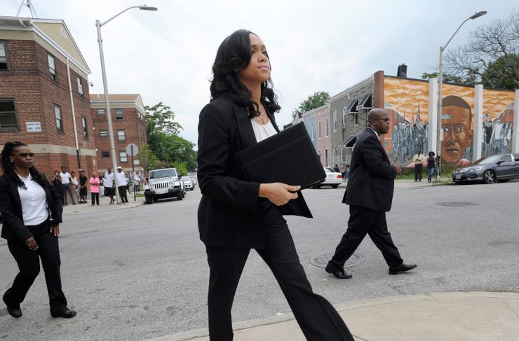 Baltimore State’s Attorney Marilyn Mosby, center, arrives for a news conference in 2016.