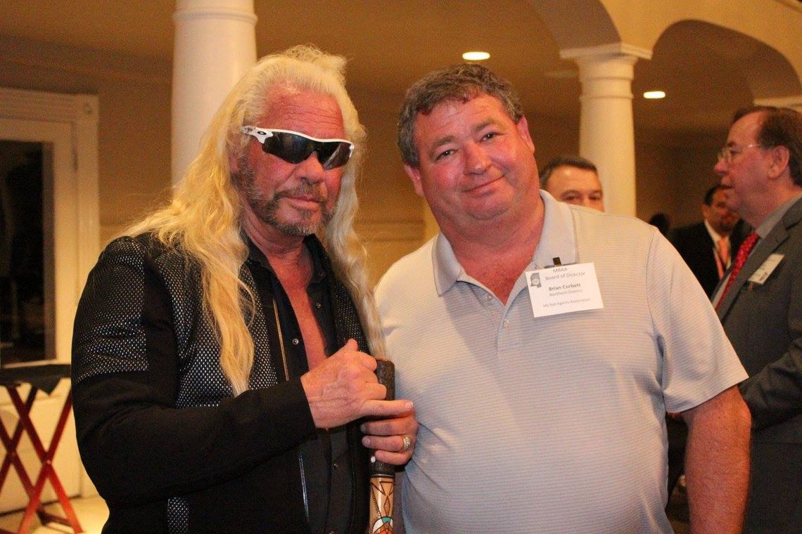 Brian Corbett, right, with Dog the Bounty Hunter at the Mississippi Bail Agents Association's 2017 legislative reception.