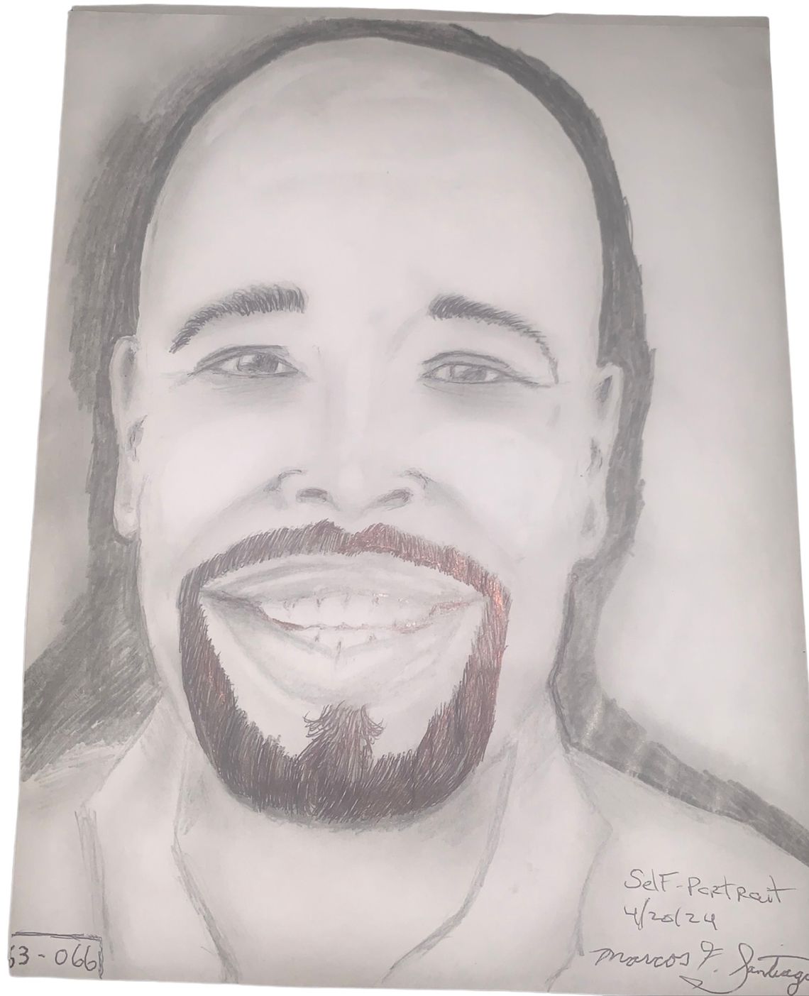 A black-and-white pencil drawing of a smiling man with a goatee.