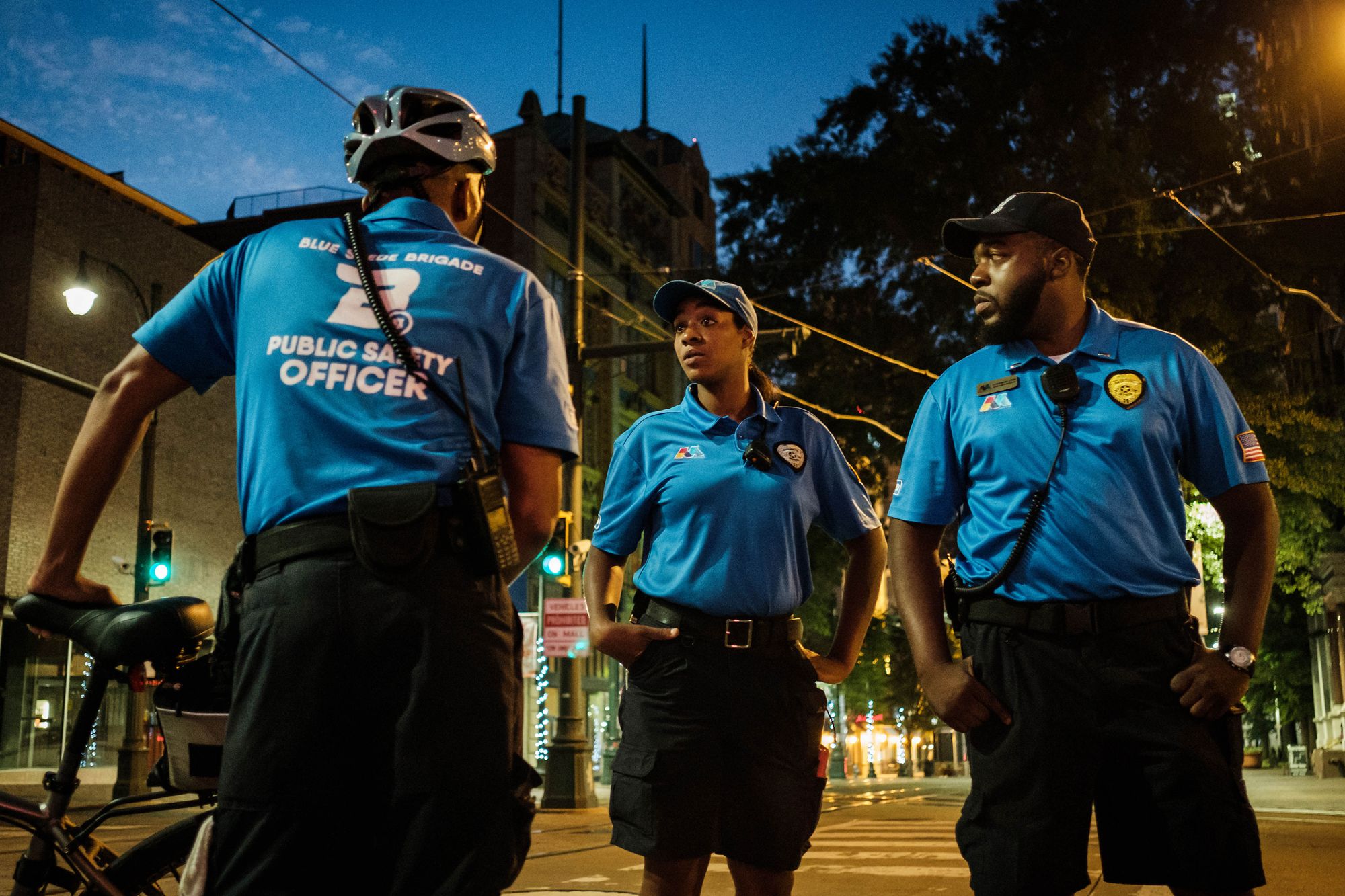 In response to a reduction in police officers in Memphis, Tenn., the Blue Suede Brigade, a private security force, patrols the city’s tourist areas. From left, Blue Suede Brigade members Kcbena Cash, Tamala Johnson and Nathaniel Lewis worked the night shift.