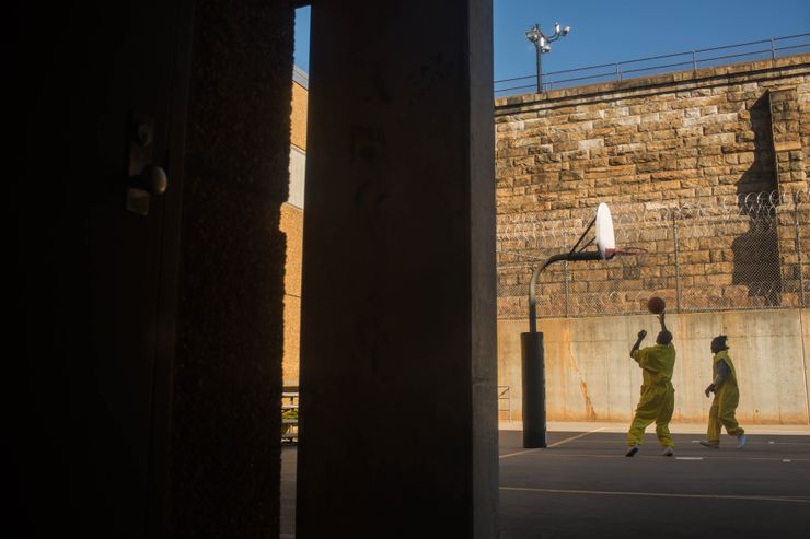 Inmates play basketball in the yard at Central Prison in Raleigh, North Carolina. Prisoners in solitary confinement get one hour of recreation a day. 