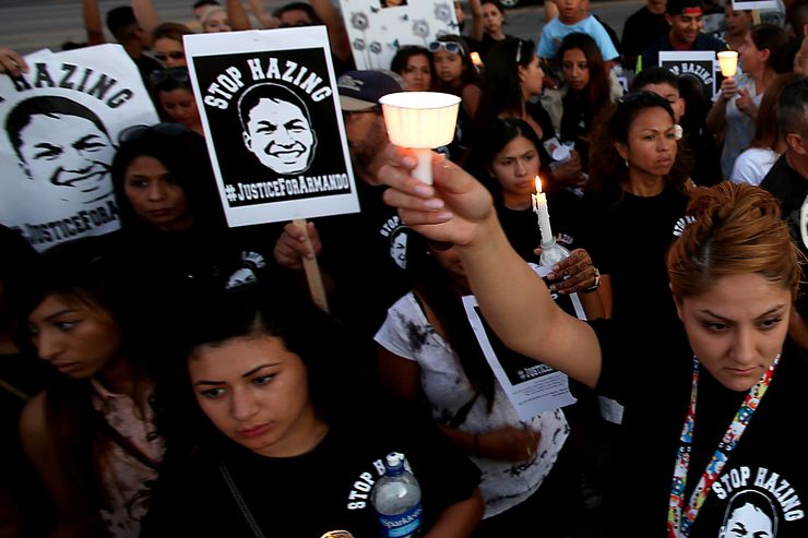 Family and friends of Armando Villa during a rally Wednesday, July 9, 2014, to call for an end to fraternity hazing at Cal State Northridge, in Northridge, California. A school investigation found that Villa, a student at CSUN, died in a hazing incident while on a hike with a fraternity.