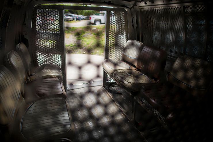 A former Prisoner Transportation Services of America van at an automotive repair shop in Smyrna, Tenn.