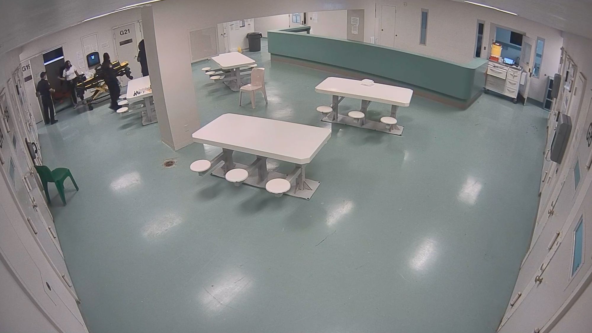 Three still images from surveillance footage show a jail pod. The first image shows a correctional officer looking into a cell. The second image shows the officer on the other side of the pod. The third image shows a group of officers and nurses outside an open cell door with a gurney. 