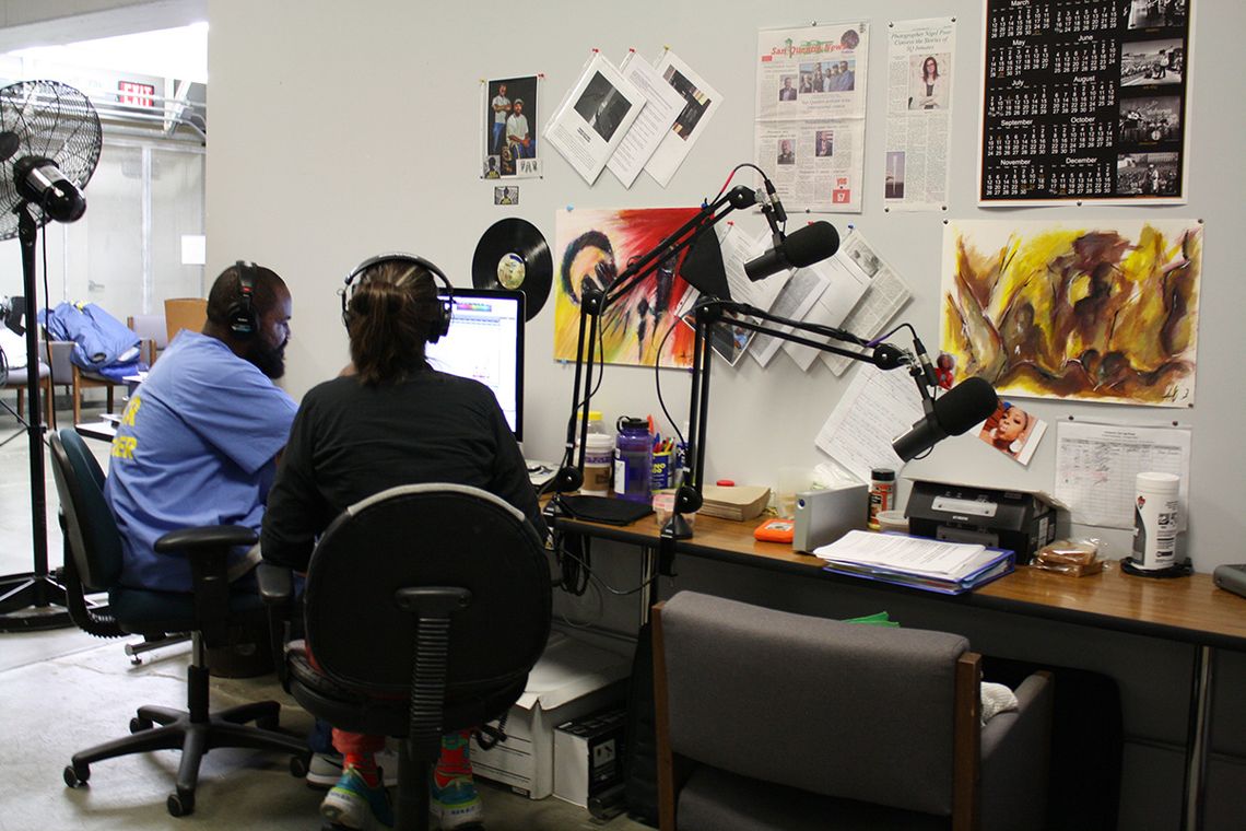 Earlonne Woods and Nigel Poor in the media lab at San Quentin State Prison. 