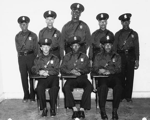 Turner keeps a group portrait of Atlanta’s first African-American police officers in his office. 