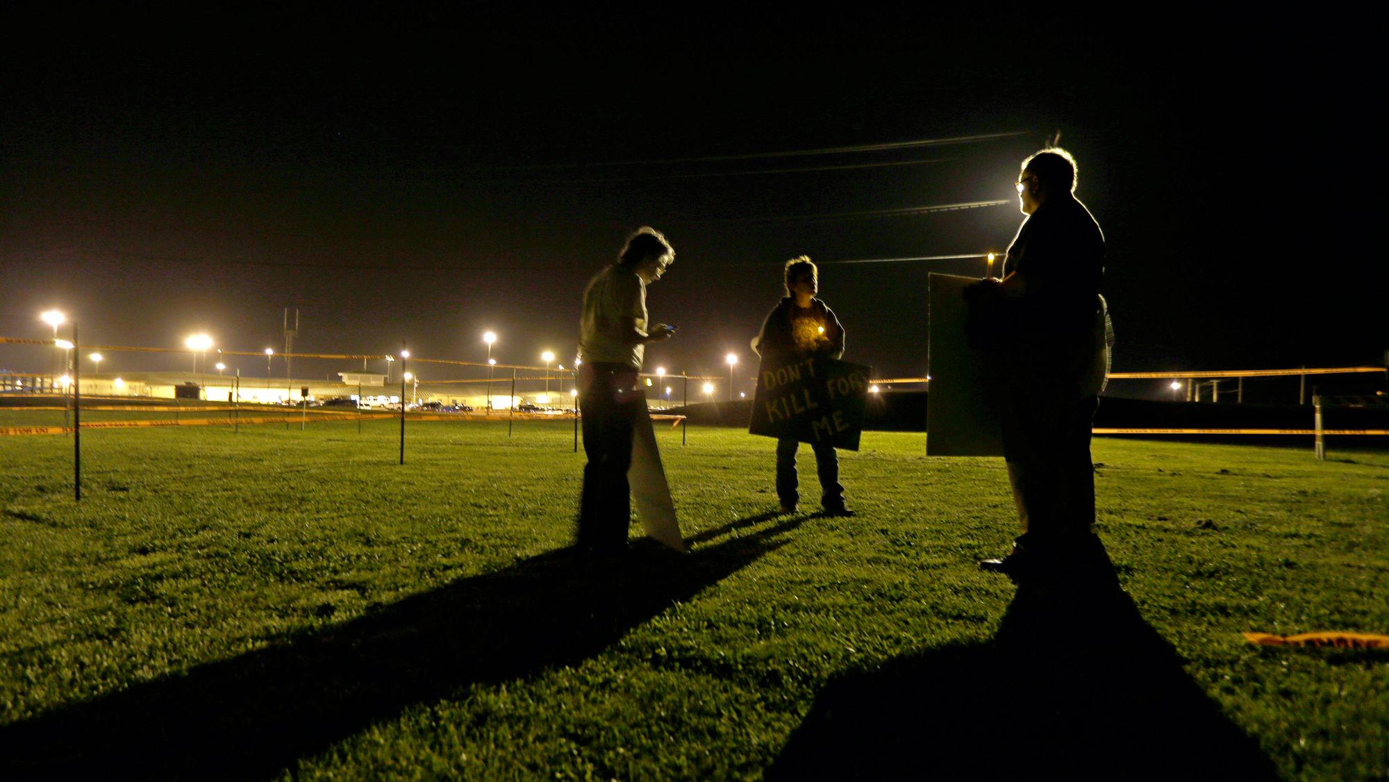 Death penalty opponents hold a vigil outside Eastern Reception, Diagnostic and Correctional Center in Bonne Terre, Mo.