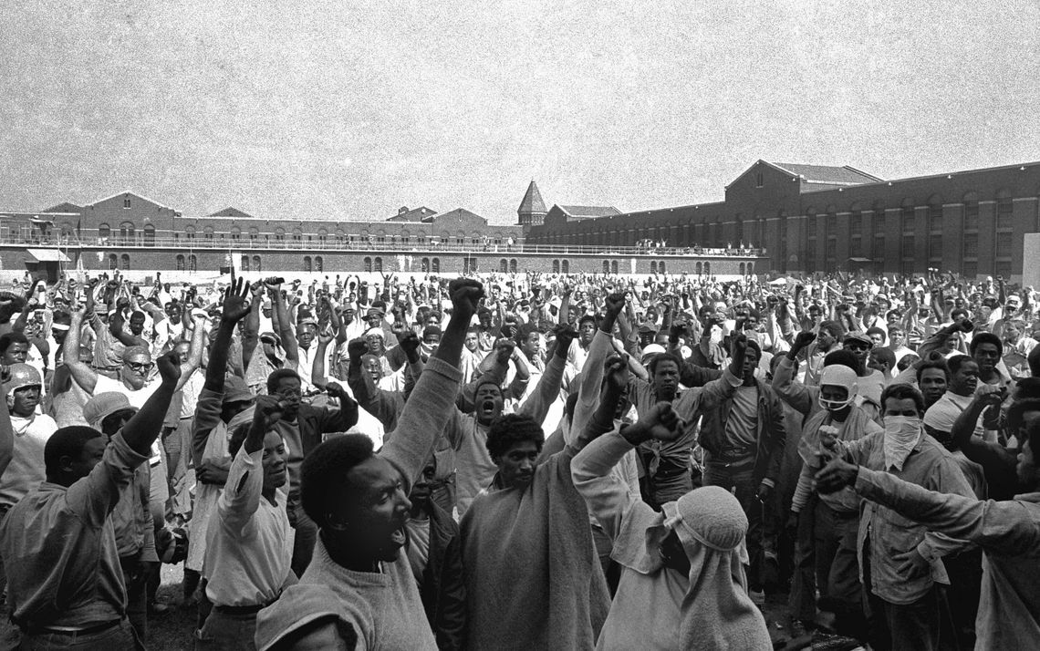 Inmates at Attica shouted their demands during a negotiating session with state corrections officials in September 1971.