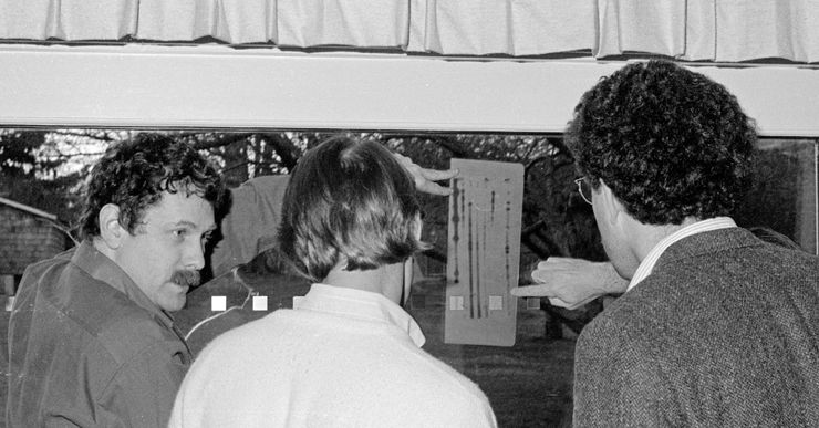 Eric Lander, left, who was just appointed to be President Biden’s science adviser, showing Peter Neufeld, right, who went on to co-found the Innocence Project, how to look at DNA in 1988.