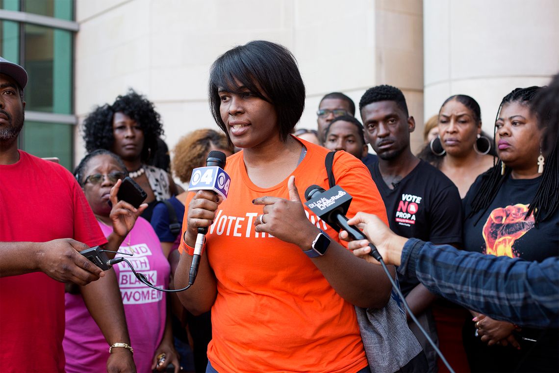 Retired Sgt. Heather Taylor, a Black woman, speaks at a 2018 press conference in St. Louis.