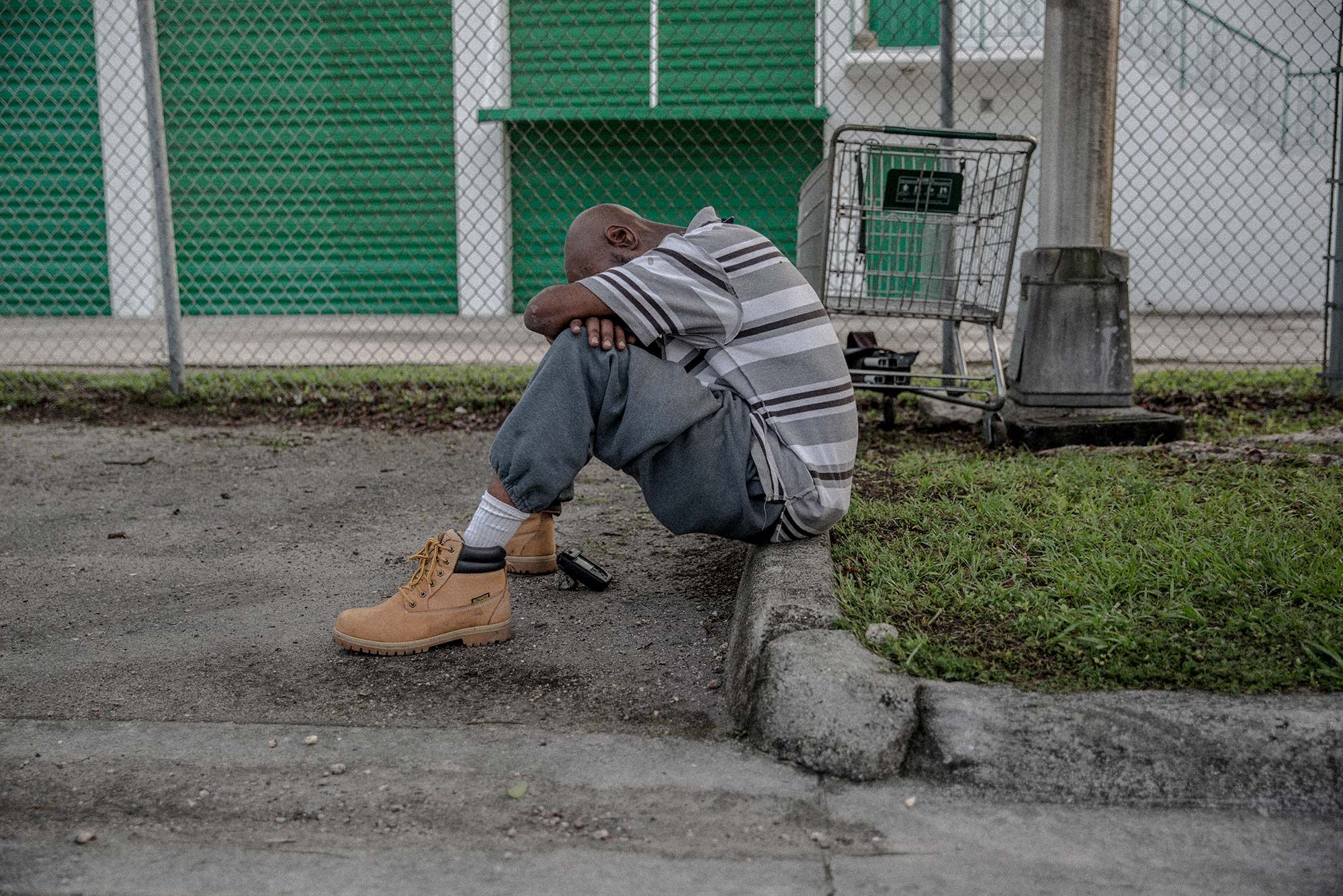 Michael Williams waits until curfew ends to leave the corner where he sleeps. In 2006, he was convicted of molesting a young girl and served three years in prison. Since his release, Williams has lived in at least six different places and has been in and out of jail on probation violations.