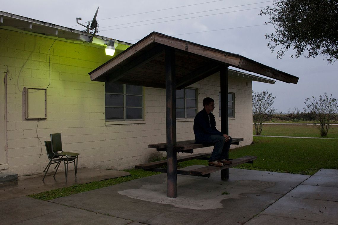 Doug sitting near the entrance of Miracle Village. 
