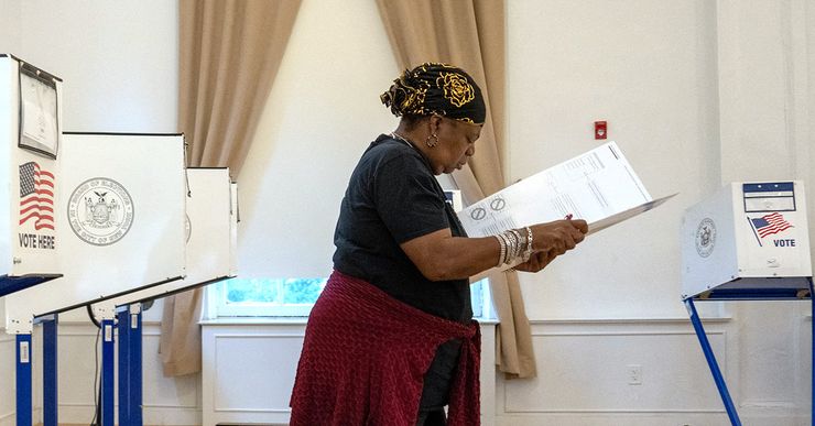 A voter casts a ballot during early voting in the Bronx Borough of New York City on November 1, 2024. (Photo by David Dee Delgado / AFP) (Photo by DAVID DEE DELGADO/AFP via Getty Images)