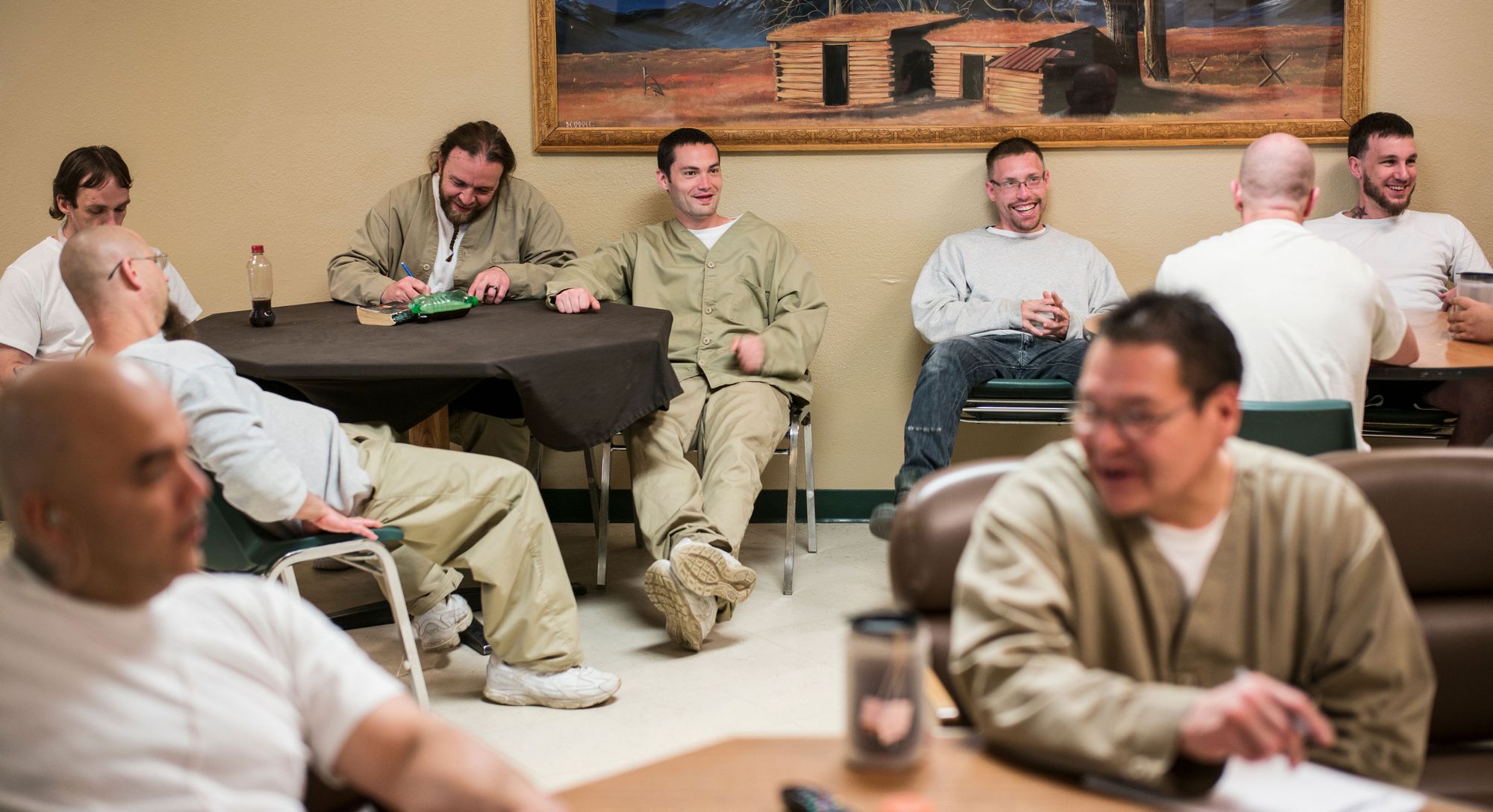 Inmates watch television at the Missouri River Correctional Center, a minimum-security facility in Bismarck, N.D., which has based some of its programs on those found in a prison in Norway.  