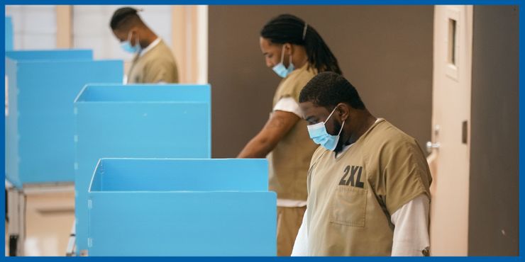 Cook County jail detainees cast their votes after a polling place in the facility was opened for early voting on October 17 in Chicago.