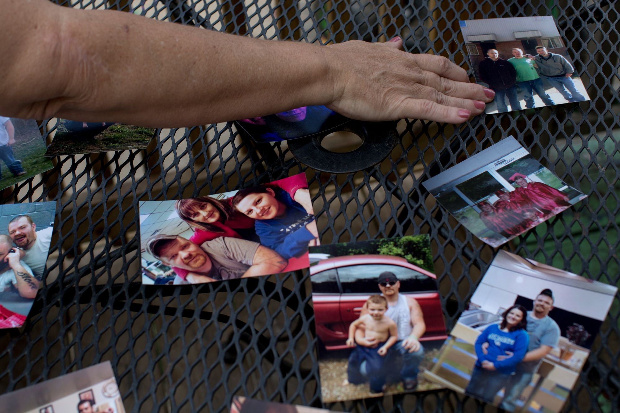 Terrie Jacobs shows pictures of her son, Christopher. 