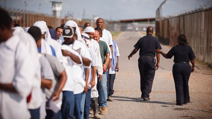 Prisoners in Angola, Louisiana, where the state prison population has dropped by 5.4 percent.   