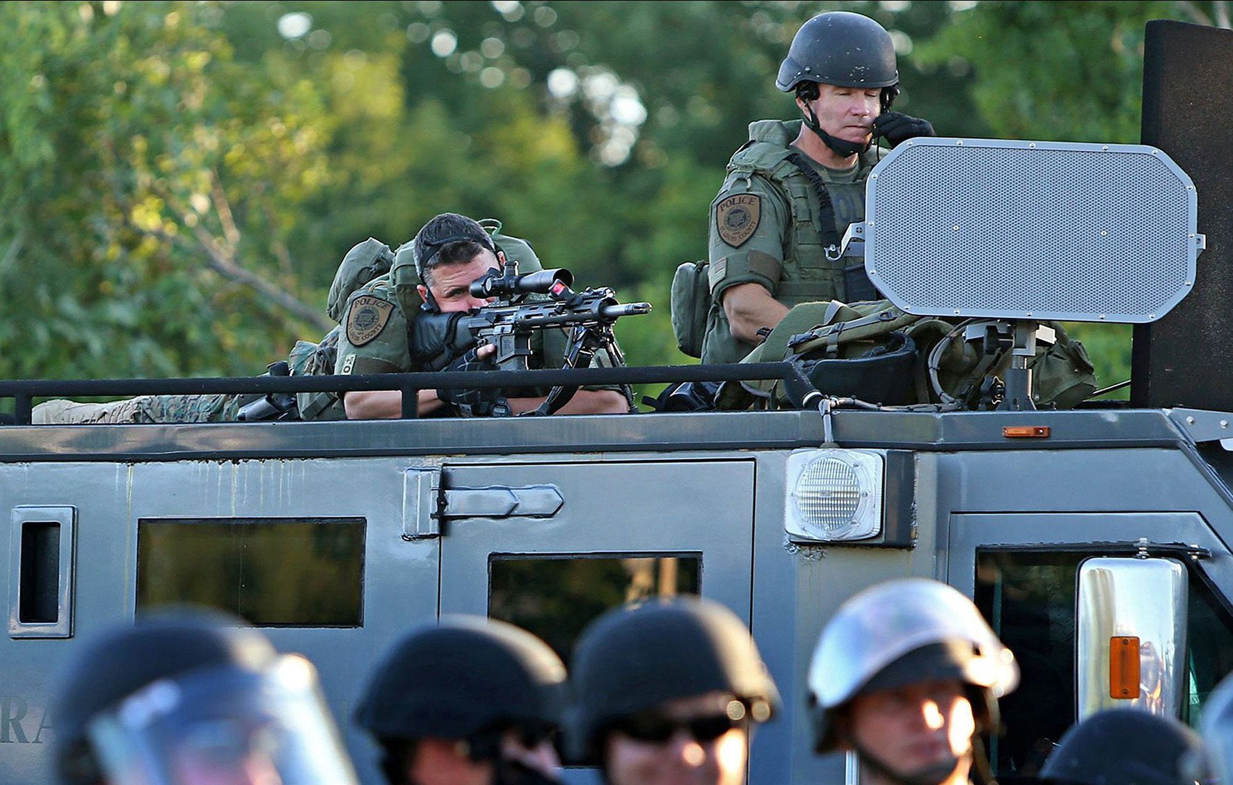 Heavily-armed police deployed during protests over the killing of Michael Brown in Ferguson, Mo., in 2014.