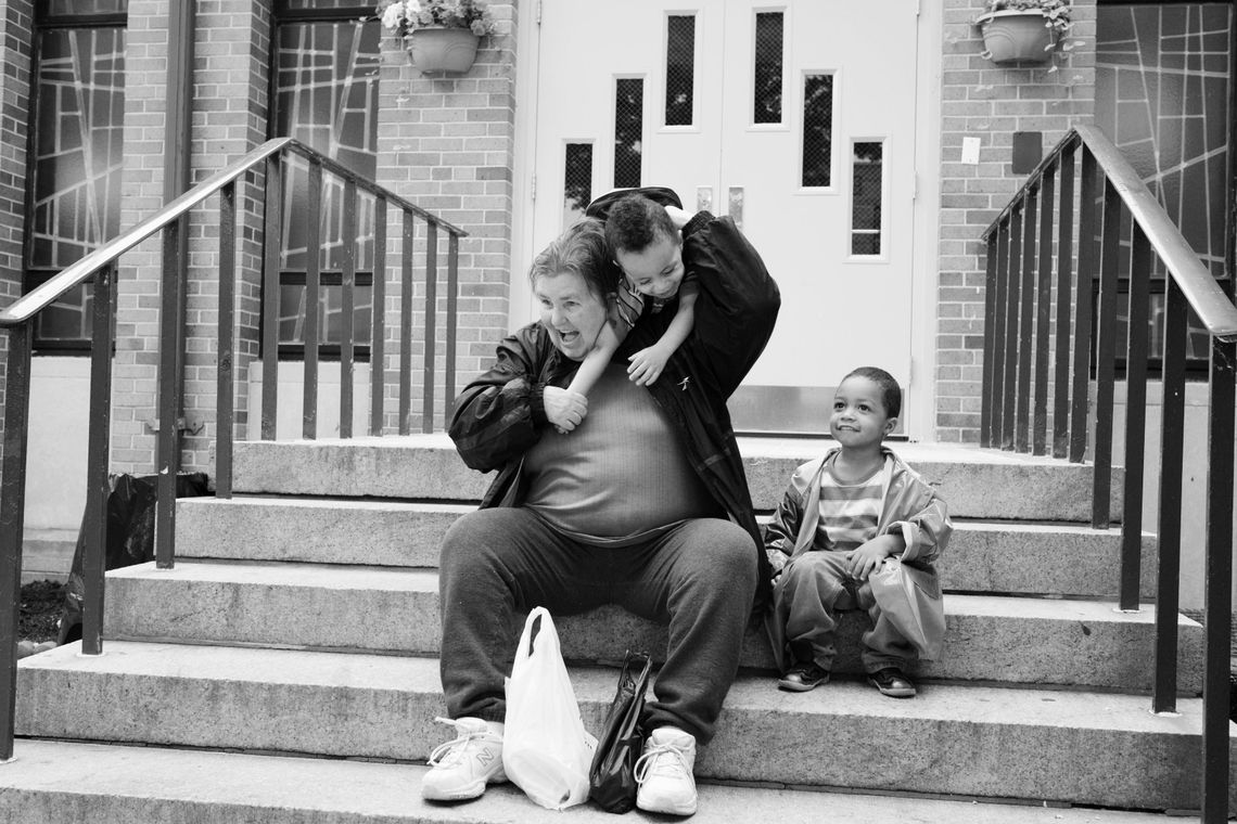 Carol, one year after her release on Mar. 18, 2014, with the children of a neighbor Cecil and Darjay. They all live in housing provided by Hour Children, an organization that provides services to formerly incarcerated women. 
