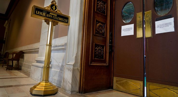 A black and gold plaque reads: “Judge Leslie Ann Celebrezze.”