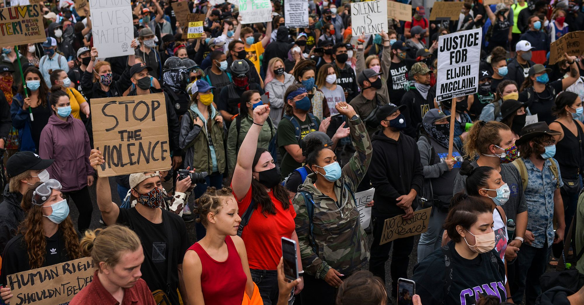 People march in the street to protest the death of Elijah McClain on July 25, 2020 in Aurora, Colorado. On August 24, 2019 McClain was walking home when he was forcibly detained by three Aurora police officers and was injected with ketamine after officers requested assistance from the Aurora Fire Rescue. McClain suffered a heart attack on the way to the hospital that night and died six days later.