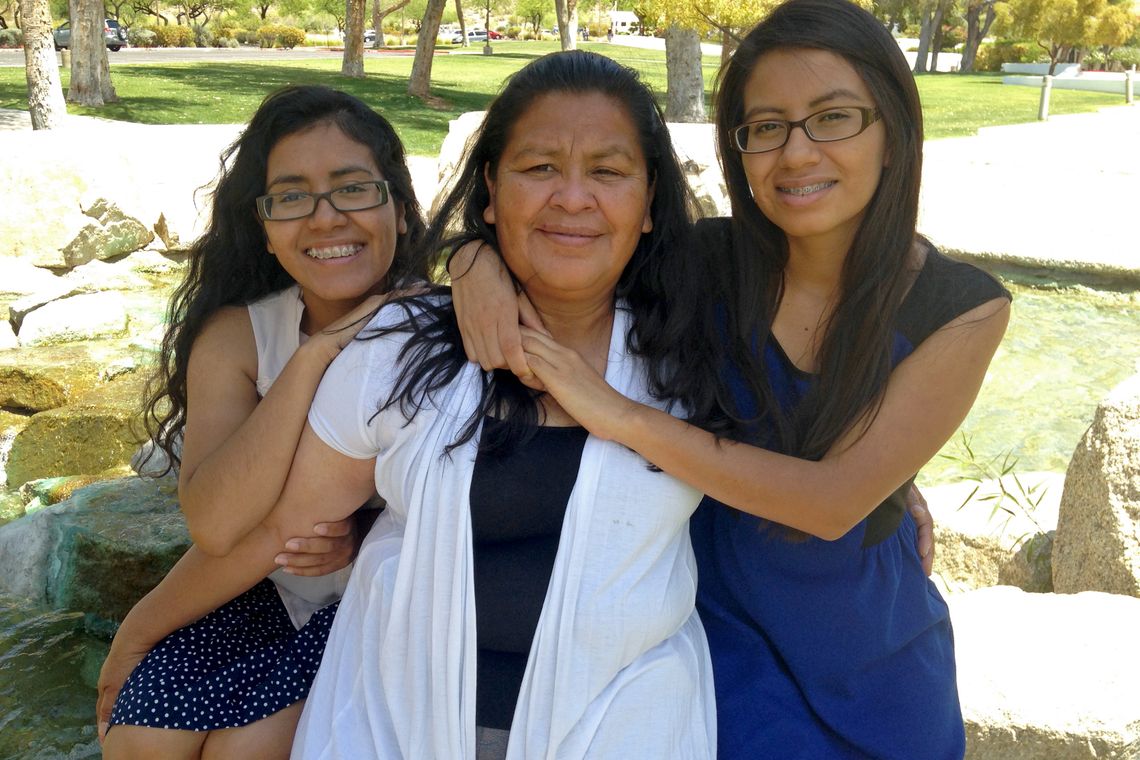 Diana Ramos, center, with her daughters Rebeca, left, and Ana, right, on May 3, 2015. 