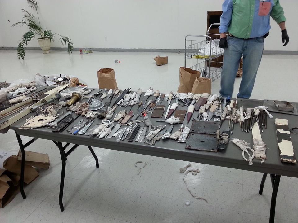 Dozens of weapons seized by corrections officials are displayed after a shakedown at Wilkinson in 2017.