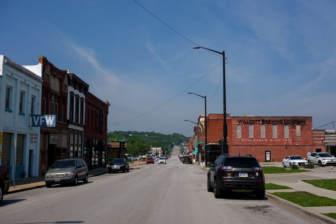 Cars are parked on a road in downtown Leavenworth, Kansas.