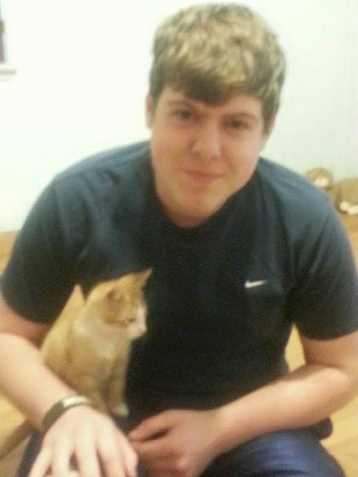 Zach Anderson and his new cat.