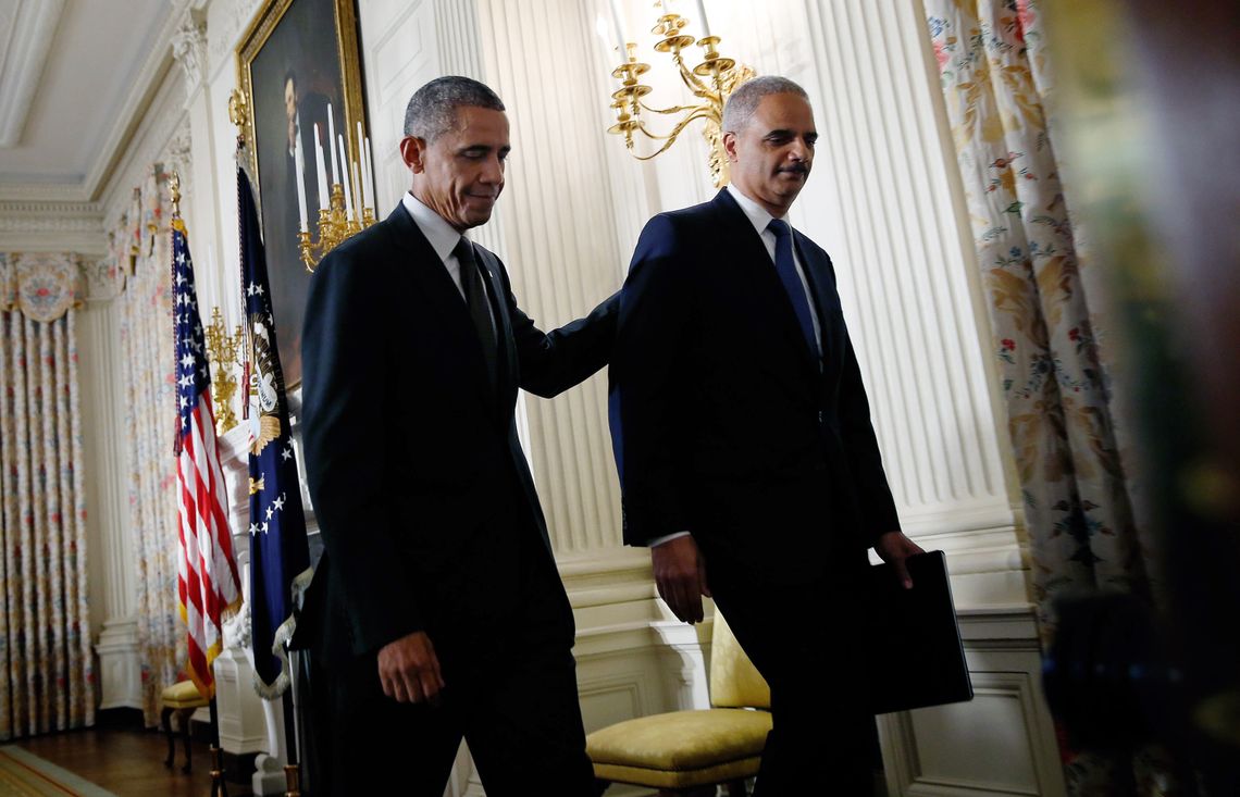 Holder with President Obama after announcing his resignation in September.