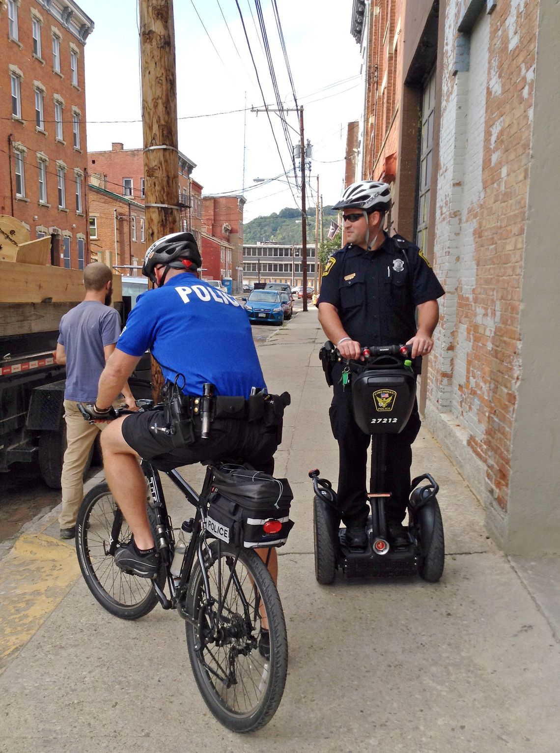 Police officers in Over-the-Rhine out on bike and Segway patrol. 