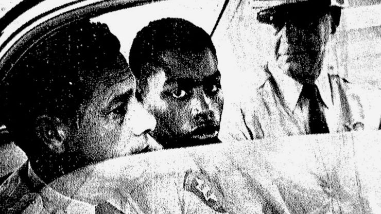 Henry Montgomery, flanked by two deputies, awaits the verdict in his 1964 trial for the murder of Deputy Sheriff Charles H. Hurt in Louisiana.  